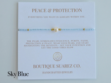 Load image into Gallery viewer, Rena Pearl Peace & Protection Carded Bracelet