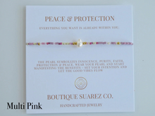 Load image into Gallery viewer, Rena Pearl Peace & Protection Carded Bracelet