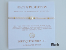 Load image into Gallery viewer, Rena Pearl Peace & Protection Carded Bracelet