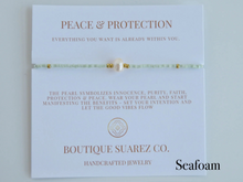 Load image into Gallery viewer, Rena Pearl Peace & Protection Carded Bracelet