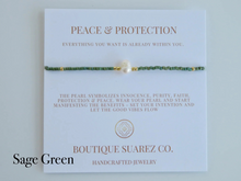 Load image into Gallery viewer, Rena Pearl Peace & Protection Carded Bracelet