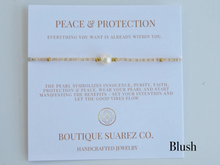 Load image into Gallery viewer, Rena Pearl Peace &amp; Protection Carded Bracelet
