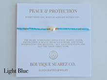 Load image into Gallery viewer, Rena Pearl Peace &amp; Protection Carded Bracelet
