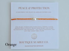 Load image into Gallery viewer, Rena Pearl Peace &amp; Protection Carded Bracelet
