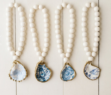 Load image into Gallery viewer, Petite Decoupage Oyster Shell Blessing Beads
